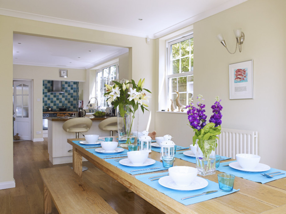 Bight and cheery table laid up for breakfast