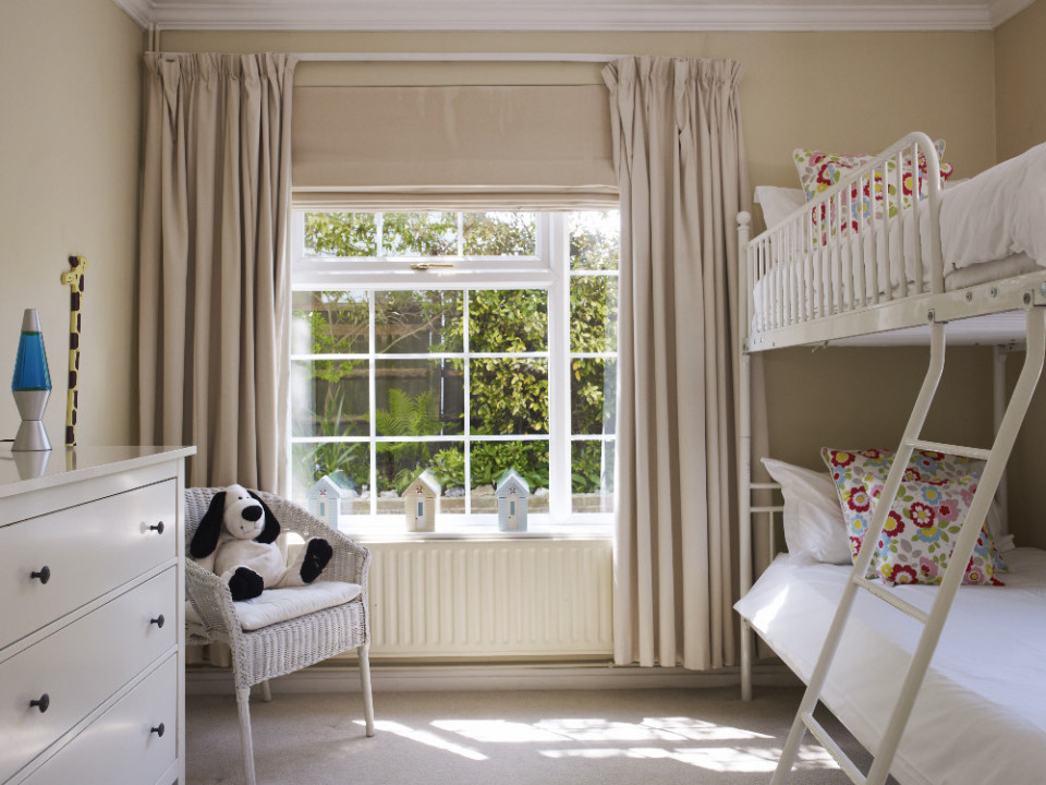 Children's bedroom with bright and appealing soft furnishings
